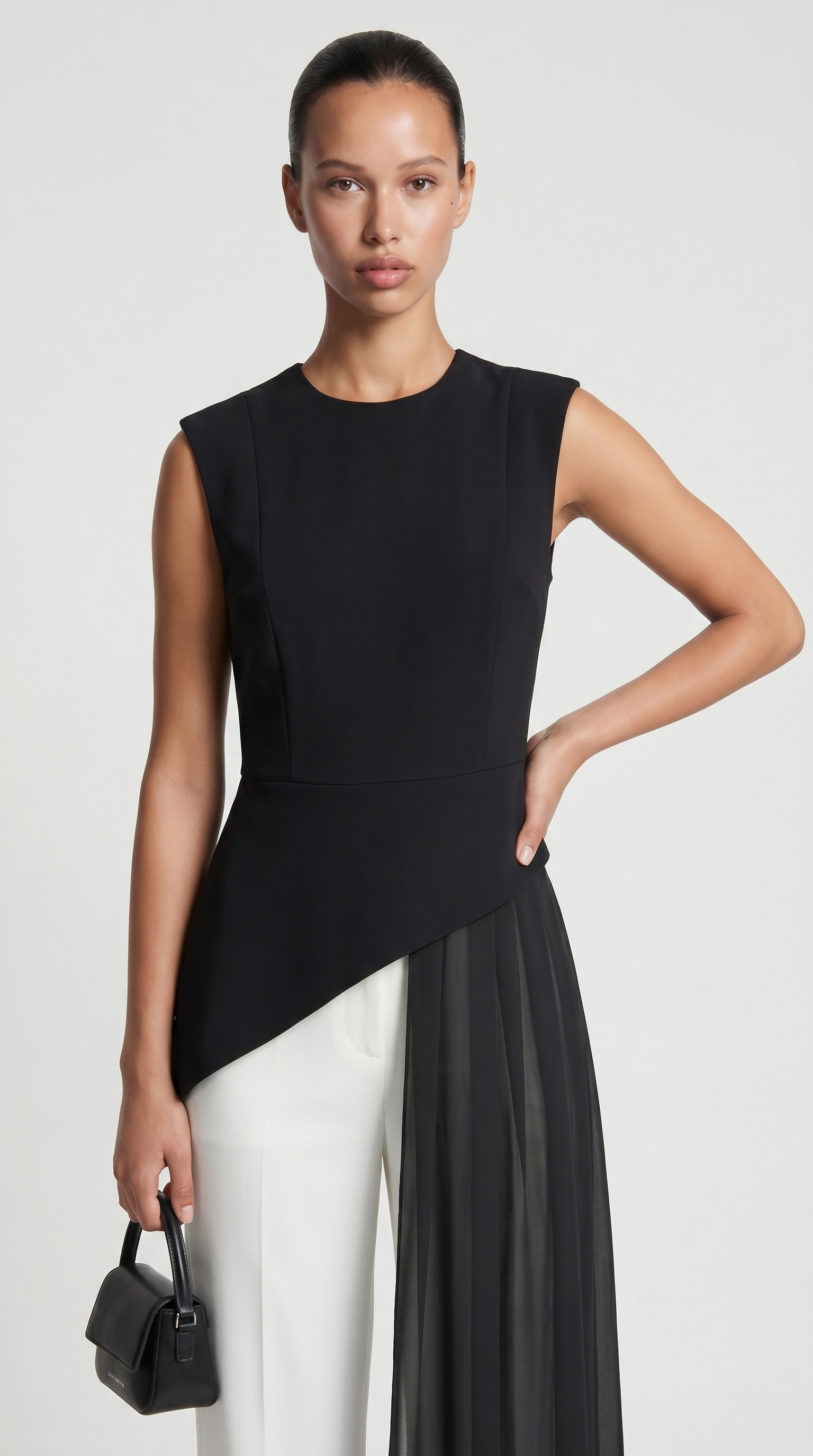 Mara - Top asymétrique en mousseline drapée à basque Noir