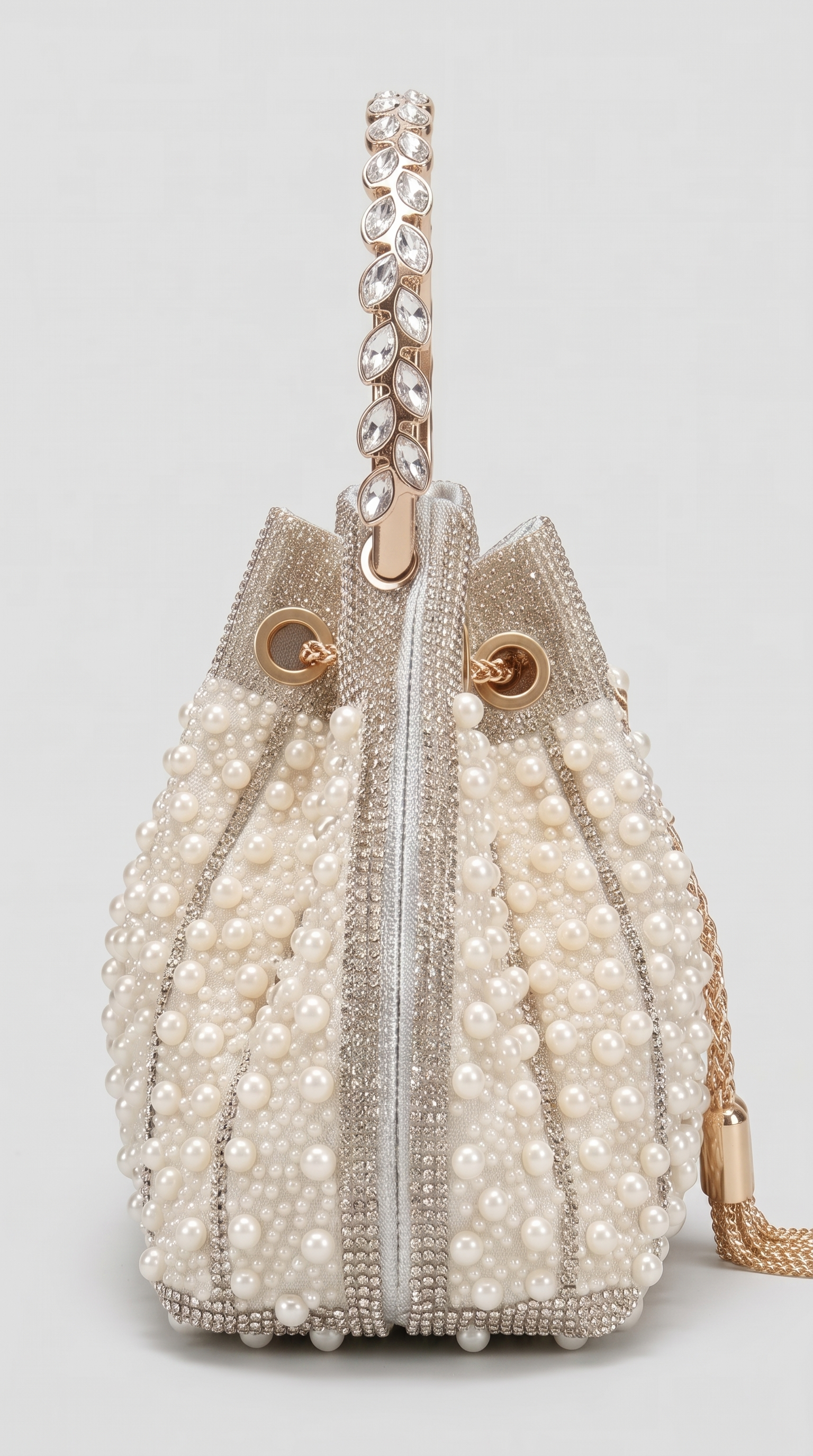 Esla - Bolso saco con cordón adornado con perlas y cristales beige